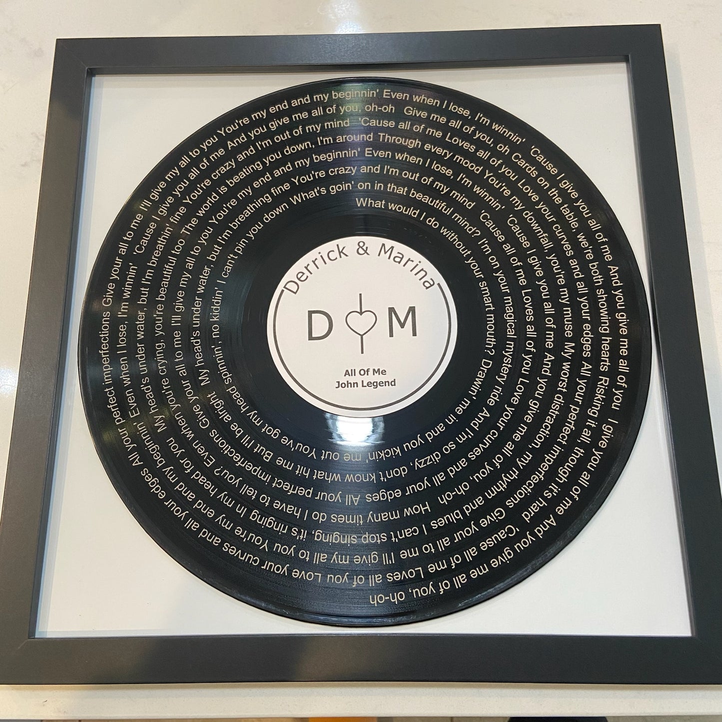 Laser-Marked Vinyl Record with Song Lyrics